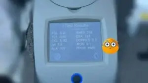 Grey Shark Pool Services in Oak Island, NC shows a digital tester with high pool phosphates (PHOS 4655) and a wide-eyed emoji overlay.